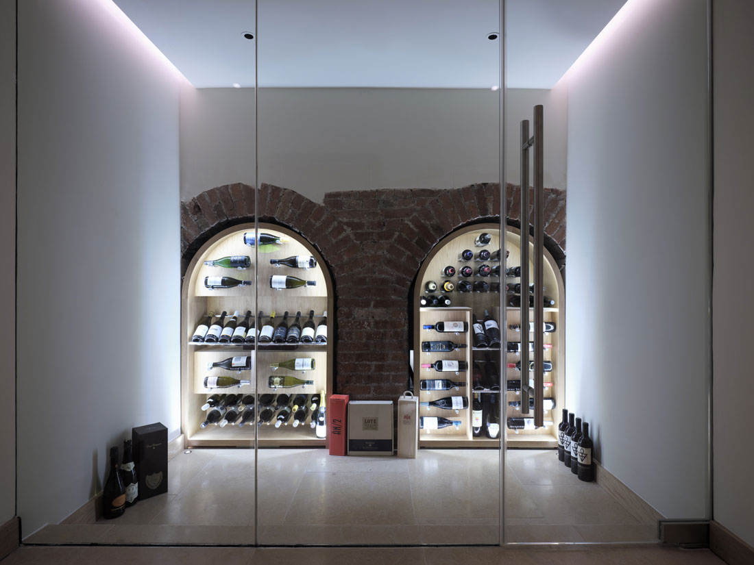 Wine cellar built into existing arches