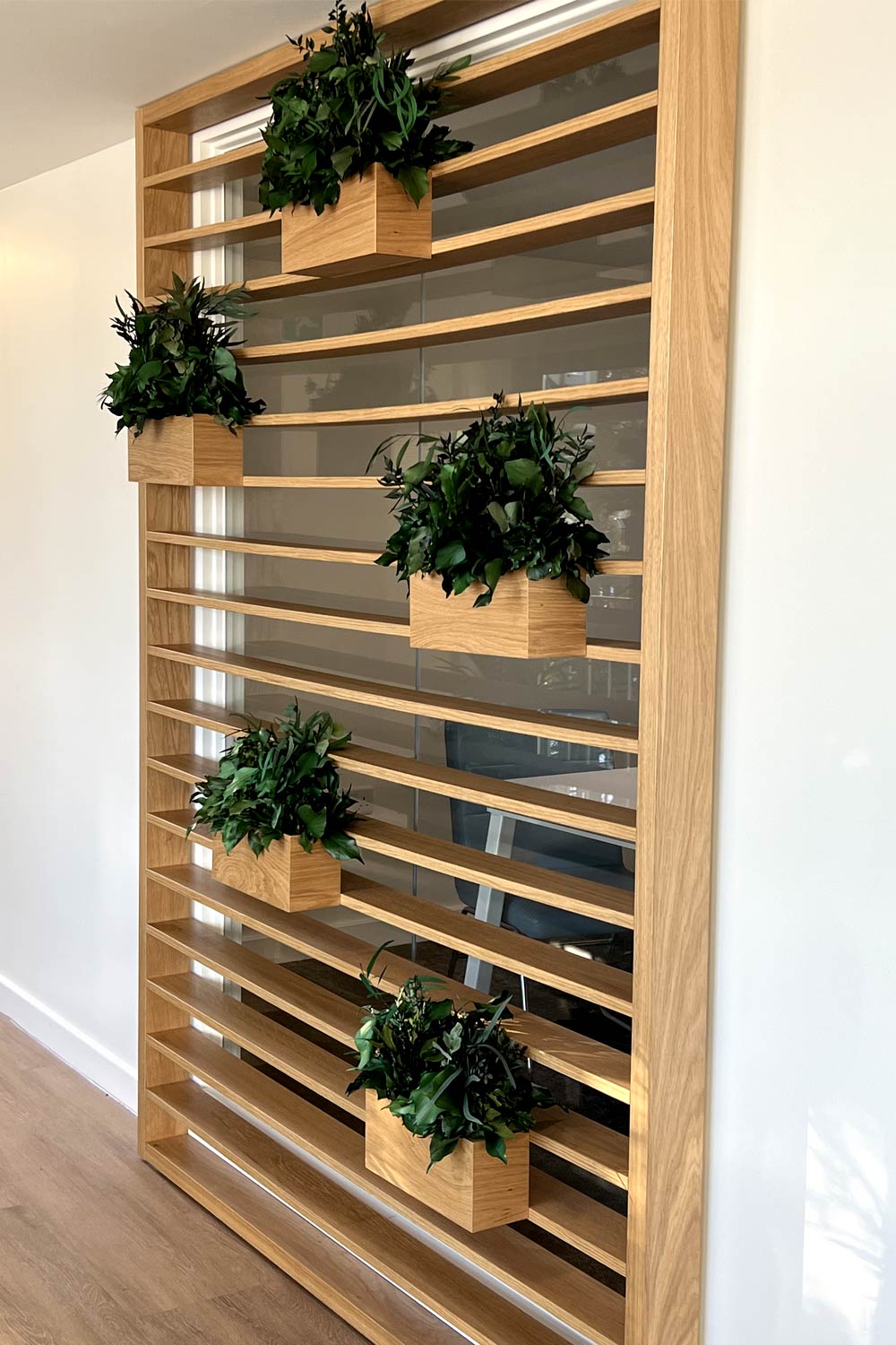 Faux plants and slats on window joseph king interiors