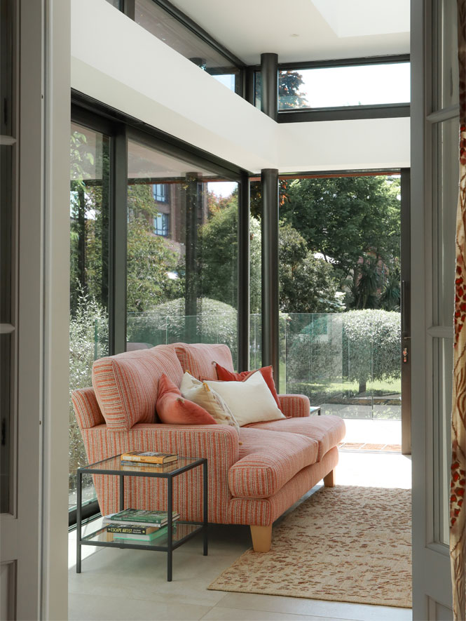 Coral sofa in modern glazed orangery joseph king interiors bristol