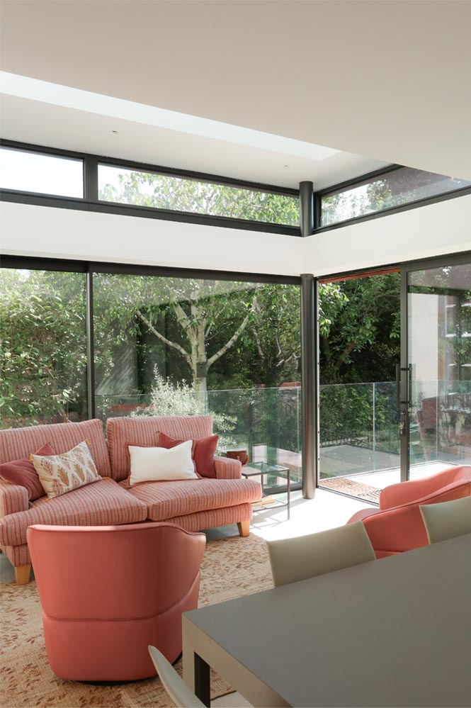 Glazed garden room with modern coral furniture joseph king interiors bristol