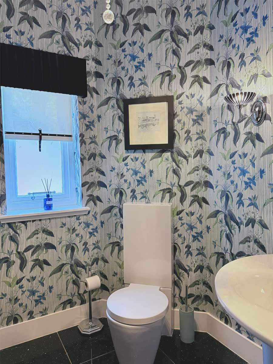 House of Hackney wallpaper cloakroom featuring stripes and florals and leaves
