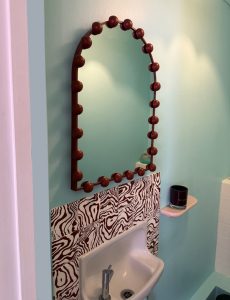 Cloakroom bobbin mirror with abstrace wavy tiles joseph king interiors bristol