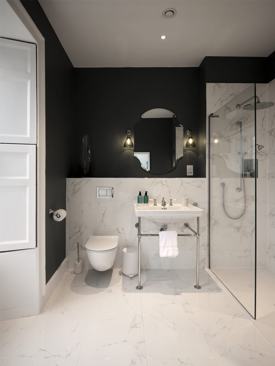 Marble bathroom with de nimes walls joseph king interiors bristol